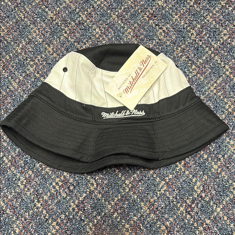 NWT Mitchell & Ness Two-Tone Bucket Hat but has some marks size S/M